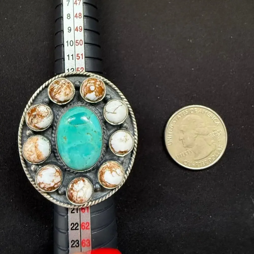 Massive handmade sterling silver turquoise & wild horse ring. Adjustable